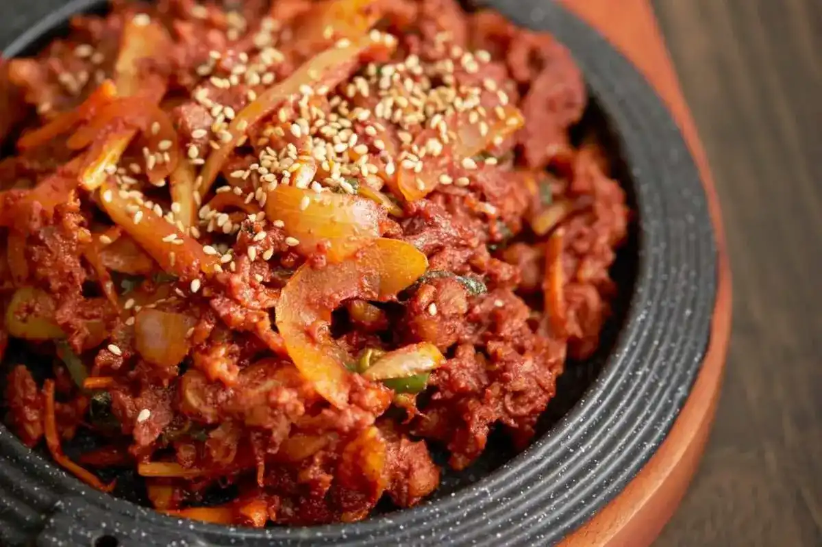 close up view of korean spicy stir fry pork jeyuk bokkeum